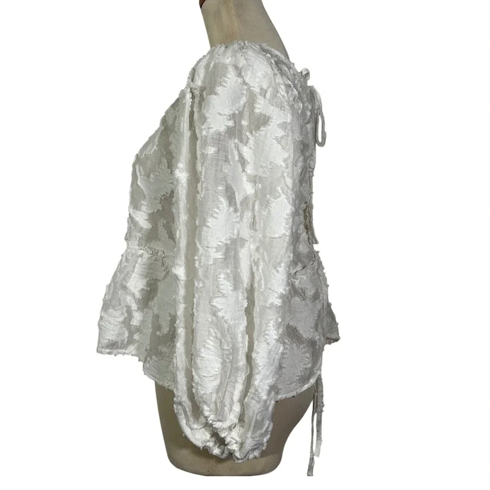Free People Peplum Blouse Womens M White Textured Puff Sleeve Tie Back Open Back